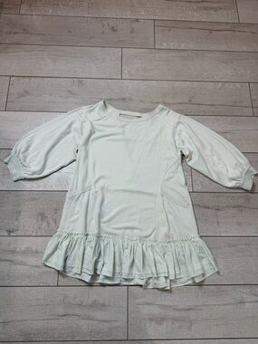 Ruffled Hem Cream Long Sleeve Tunic Top